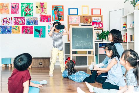 Group Of Preschool Kids In Classroom By Stocksy Contributor Maahoo