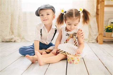 Little Boy And Girl In The Room Love Concept Stock Photo Image Of