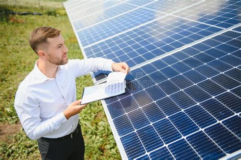 Engineer At Solar Power Station With Solar Panel Practical Lessons On