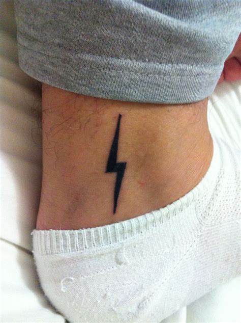 The realistic lightning tattoo designs are mostly lightning bolt tattoos made with multicolour. Lightning bolt ankle tattoo | Tattoos, Ankle tattoo, Bolt ...