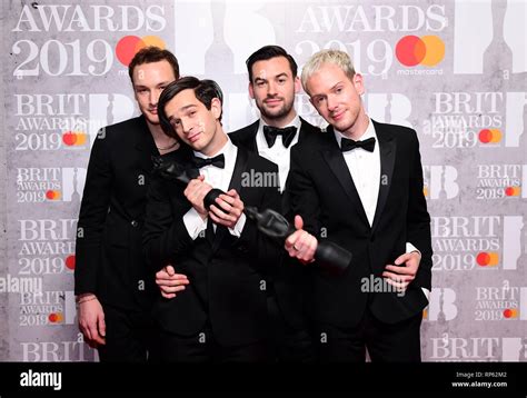 matthew healy ross macdonald george daniel and adam hann of the 1975 with their best british