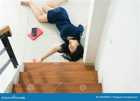 Asian Woman Falling Down Of Staircase And Having Injured At Home Stock Image Image Of Defeated