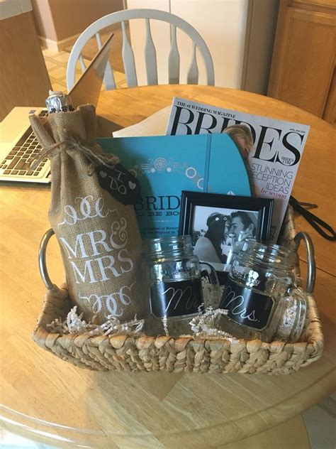 Whether modern or traditional engagement gifts. Engagement gift basket | Engagement gift baskets ...