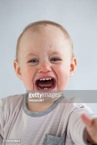 Portrait Of Screaming Baby Girl High Res Stock Photo Getty Images