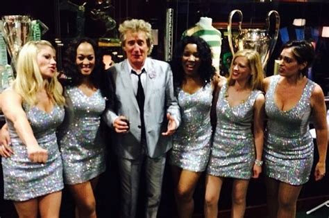 Glasgow 2014 Rod Stewart Had All The Luck As He Posed For A Picture With His Mini Skirted