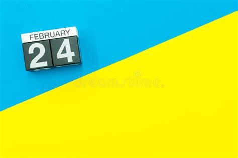 February 24th Cube Calendar For February 24 On Wooden Surface With