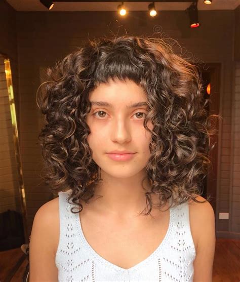 16 Best Ways To Have Curly Hair With Bangs In 2021