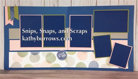 An Open Scrapbook With Blue Pages And Polka Dots