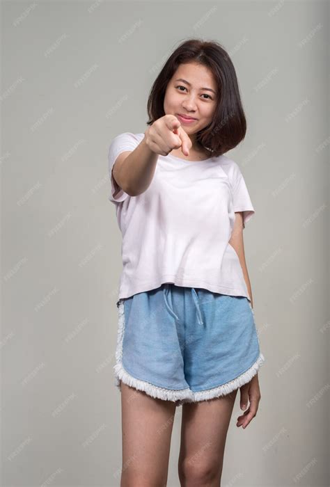 Premium Photo Young Beautiful Asian Teenage Girl With Short Hair On White