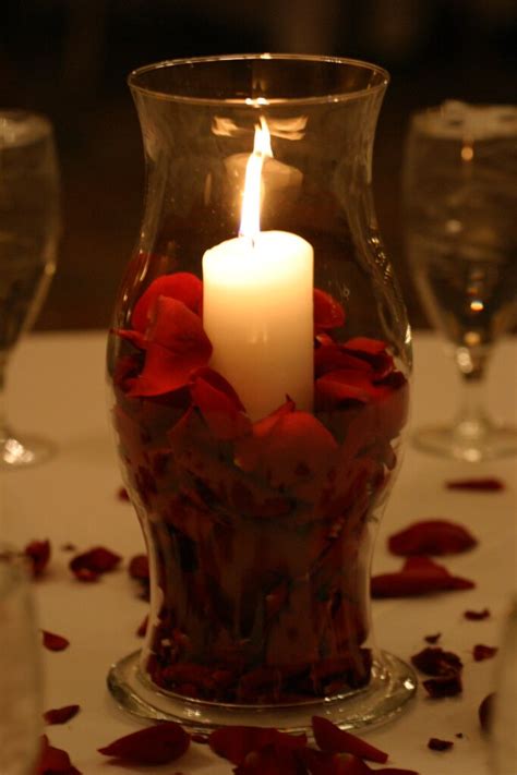 Hurricane Centerpiece With Pillar Candle And Rose Petals Cakes
