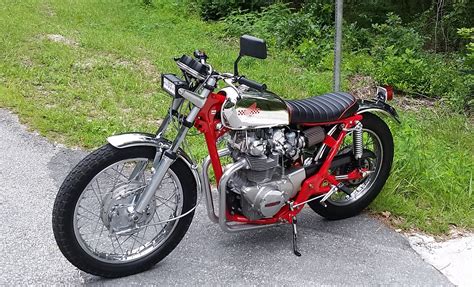 To make sure everything was fine after storage, the seller rebuilt the petcock and installed new tires/chain/fork. Honda CL450 Brat by Tom Hernden - BikeBound