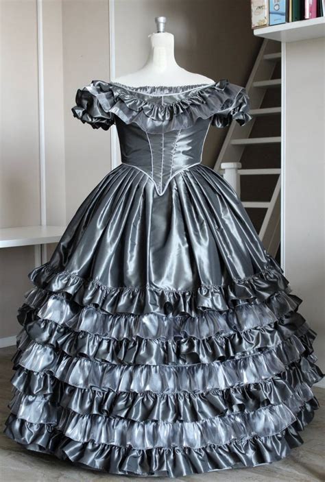 I made mine a combination of the two. Victorian ball gown in grey taffeta and organza silver ...