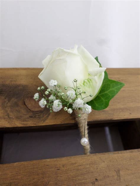 Wedding Buttonhole Made Using A White Rose Ivy And Gypsophila Created