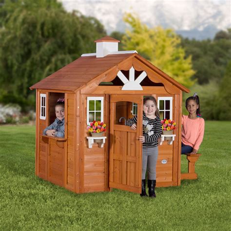 This is part playhouse, part jungle gym, but all fun. Playhouse Backyard Discovery Summer Cottage Wooden Cedar ...
