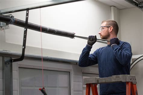 Up & over garage door repair of atlanta. Garage Door Spring Repair
