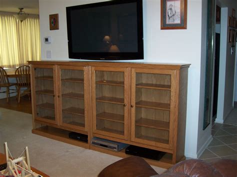 Check spelling or type a new query. Arthur W. Brown Custom oak media cabinets. Finished with ...
