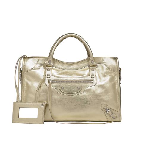 Check out our balenciaga bag selection for the very best in unique or custom, handmade pieces from our handbags shops. Balenciaga Metallic City Bag Reference Guide | Spotted Fashion