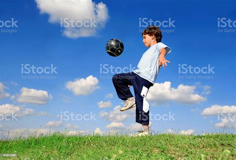 Boy Playing Soccer Stock Photo Download Image Now Agricultural