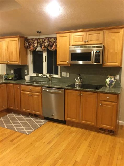 Updating oak kitchen cabinets is easier than you think. 4 Ideas: How to Update Oak or Wood Kitchen Cabinets | Oak ...