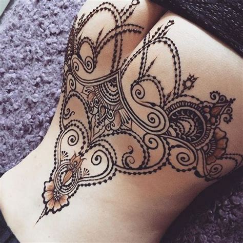 Henna ankle tattoos are often designed to look like anklets and foot jewelry. Lower Back Henna Tattoos