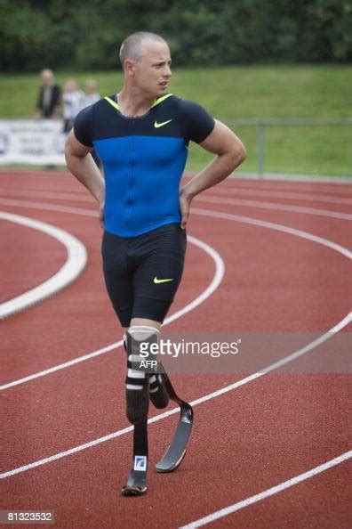 South African Athlete Oscar Pistorius Walks During A Training Session