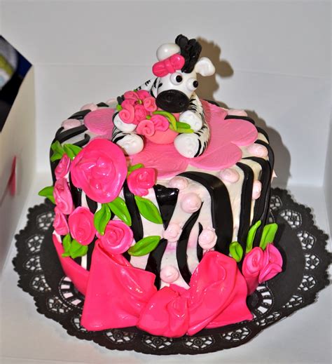 They provided the baby elephant backdrop and stand. Leah's Sweet Treats: Zebra Print Baby Shower Cake and Cupcakes