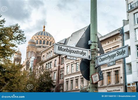 Signpost With Street Names On Crossroads In Berlin Editorial Stock