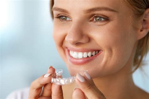 Young Blonde Lady With Invisalign 1 2 1 Dudley Smiles Orthodontics