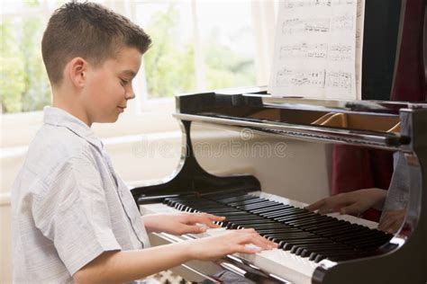 Boy Playing Piano stock photo. Image of instrument, kids - 6441456