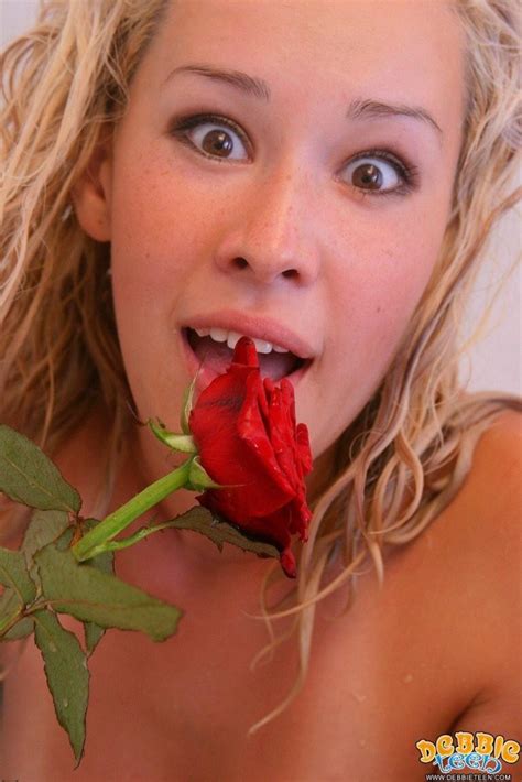 Gorgeous And Young Teen Debbie Posing Naked With Red Rose Porn Pictures