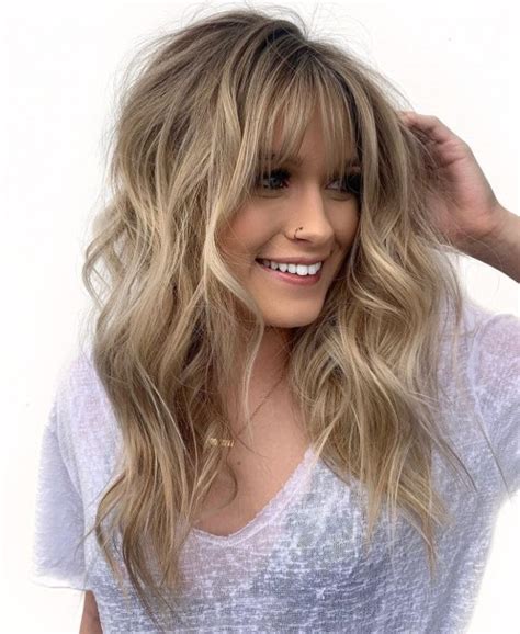 Layers in hairs bring volume, make flimsy locks look with the round face, the long haircuts with curls are commonly complimenting. 50 Cute Long Layered Haircuts with Bangs 2021