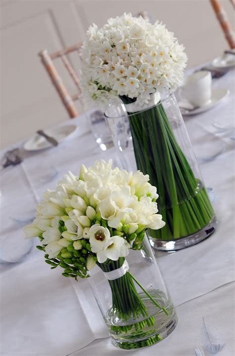 Create a glamorous reception table with a cluster of small flower arrangements and chic antique gold bowls. Spring Wedding Flower Bouquets