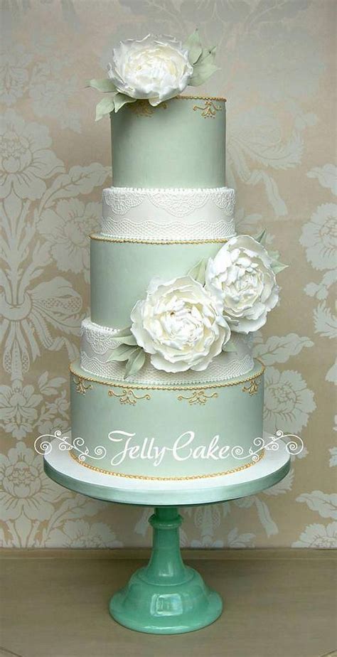 Pale Sage Green Tiers With Half Height Edible Lace Covered Tiers And