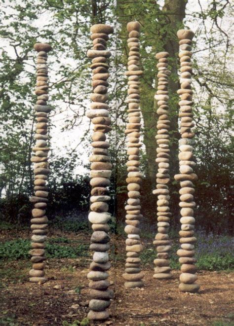 The larger the base, the more stable the object is. tall stacks | Garden art, Outdoor art, Stone art