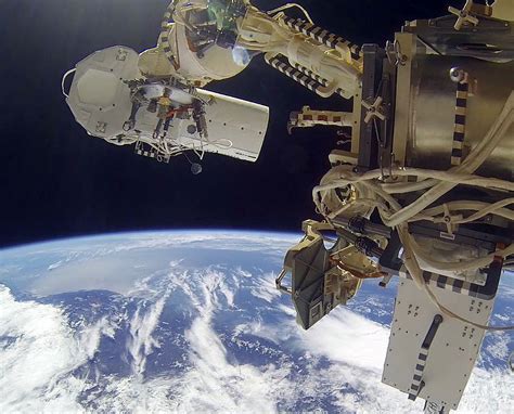 Cosmonauts Repeat Spacewalk To Add New Earth Viewing Cameras To Space