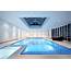 Indoor Pool With Skylight And Attached Spa