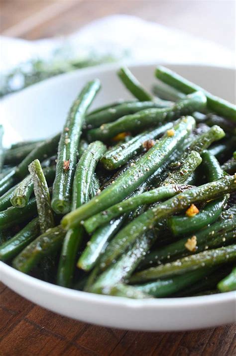 Be sure to rinse the green beans and remove the stem sautéing the green beans first achieves two things. Summer Savory and Garlic Green Beans - Life's Ambrosia
