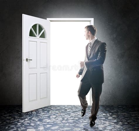 Young Businessman Standing With Back Opening Door Stock Photo Image