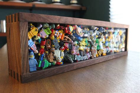 here s a wooden shadowbox i made for my minifigure collection r lego