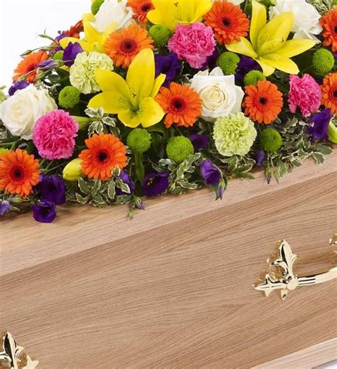 Same day hand delivery in 4 hours! Vibrant Casket Spray 4ft - Funeral Flowers Stockton-on-Tees