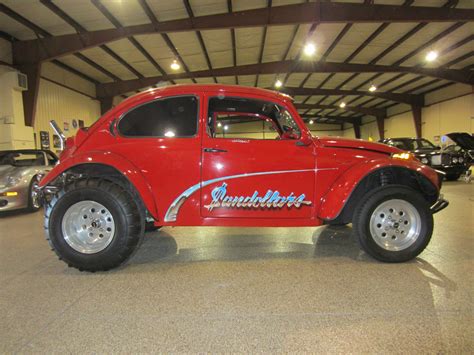 Darren parsons is with jeff mccarthy and this is his baja bug, using an old vw beetle as the basis for this machine. CUSTOM CLASSIC SHOW MUESUEM QUALITY BAJA BUG 100% RESTORED