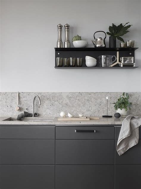 Dark Grey Kitchen With A Natural Stone Top Via Coco Lapine Design