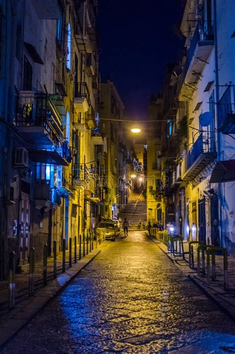 Night View Of Illuminated Street Leading Through The Historical Center