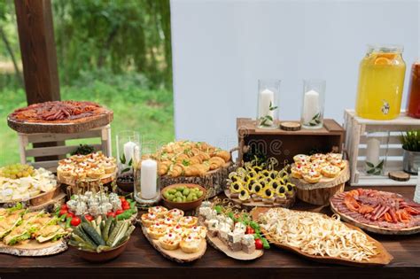 Tasty Meals On A Brown Rustic Wooden Banquet Table Stock Photo Image