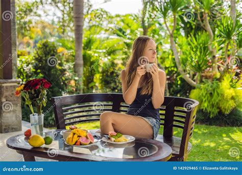 Woman Eating Breakfast On The Terrace This Energy Boost For The Whole