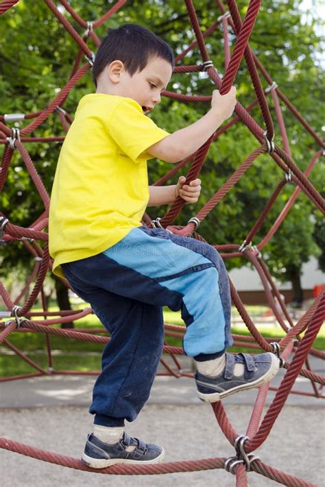 Child Climbing At Playground Stock Photo Image Of Acrobatic Park