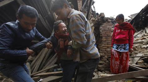 nepal earthquake rescuers dig with bare hands for survivors as death toll rises world news