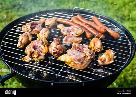 Delicious Variety Of Meat On Barbecue Grill With Char Coal Grilling