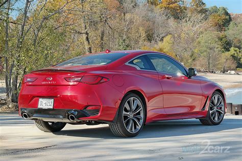 Used 2018 infiniti q60 red sport 400 with rwd, keyless entry, fog lights, leather seats, alloy wheels, heated mirrors, seat memory, adaptive suspension, and sport. 2018 Infiniti Q60 Red Sport 400 AWD Review | Web2Carz