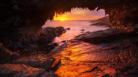 Download Horizon Sunset Sea Ocean Beach Nature Cave Hd Wallpaper